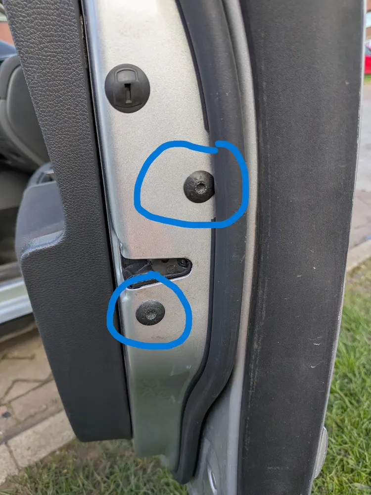 Location of M6 spline bolts that hold the door actuator in place on a Volkswagen Mark 5 Golf 2007