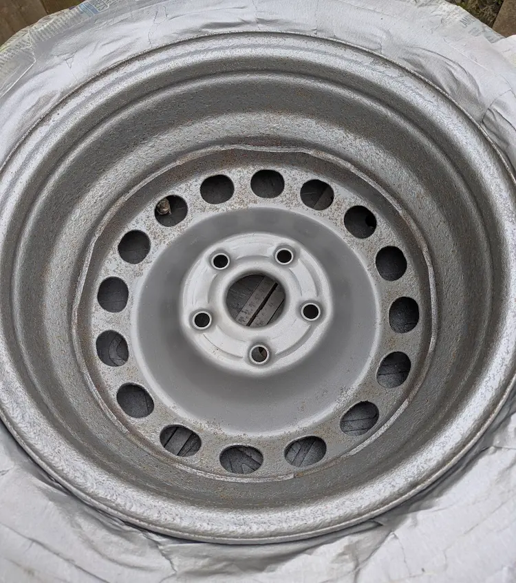 Rusty wheels through paint