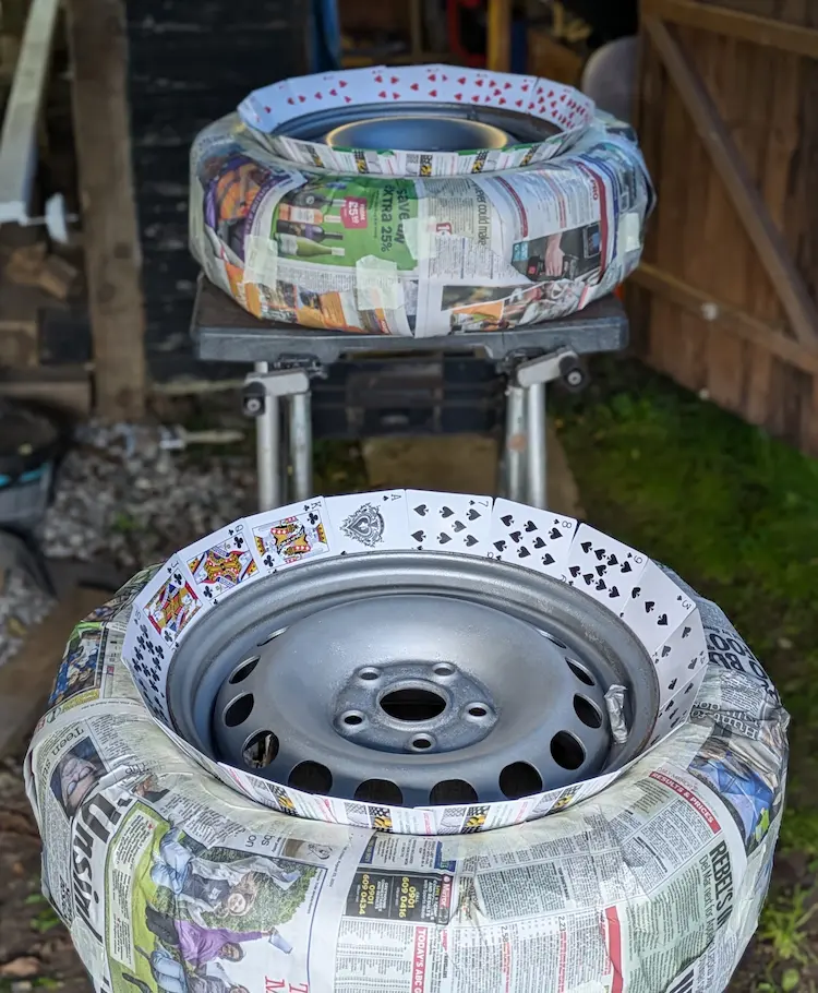 Using palying cards on wheels whilst painting them