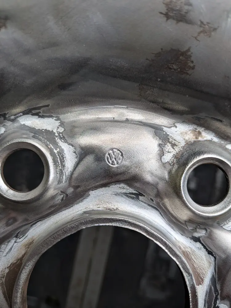 Stripped down to bare metal steel wheel